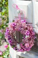 A wreath of Hydrangea 'Pink Annabelle' ( hydrangea ), Phlox