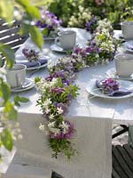 Late summer - table decoration with flowers garland