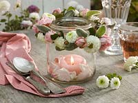 Jar with wreath of pink ( roses ), Chrysanthemum