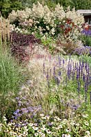 Atmospheric planting with ornamental grasses and annuals