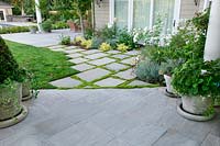 Natural stone terrace with patio plants