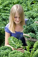 Girl with Brassica oleracea var. sabellica