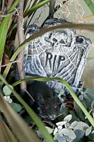 Halloween decoration with tomb stone and rat