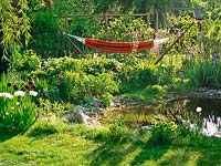 Gardenscene in summer with hammock