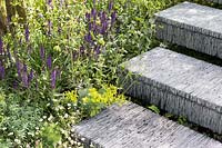 Steps made from hand-cut slate stacked together. The Brewin Dolphin Garden. RHS Chelsea Flower Show, 2015