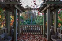 East Ruston Old Vicarage Gardens, Norfolk, Winter ( Alan Gray and Graham Robeson ). Pergola overlooking the exotic garden