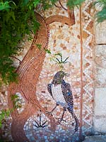 Mosaic wall with bird