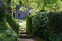 Iford Manor, Wiltshire,. Early summer, Italiante garden designed by Harold Peto