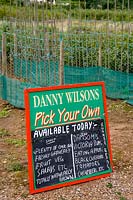 Pick Your Own Fruit and Vegetable farm, Somerset, UK ( Danny Wilson ) Sign with list of produce