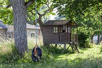 Wooden tree house or wendy house at Chateau Rigaud, Bordeaux, France