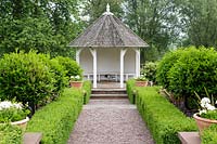 Mitton Manor, Staffordshire.  Summerhouse in formal garden parterre