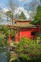 Compton Acres, Dorset, UK. Large wooded garden in eary spring, the Japanese garden