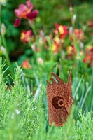 Sheila White's garden, Queens Gate, Bristol, UK. Rusted metal 'owl'