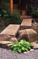 Chelsea FS 1995 Design Julian Dowle and Koji Ninomiya Japanese garden with stone bridge walkway over pond