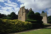 Crathes Castle Scotland hedges and topiary with view of castle