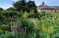 West Lodge South Sussex cottage garden with mixed panting of annuals perennials and shrubs
