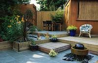 private garden London Design Kristina Fitzsimmons small town patio garden with split levels water feature seating
