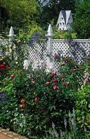 Chelsea FS 1997 Design Julian Dowle White woven fence mixed border and Dovecot