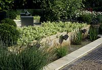Hampton Court FS 1993 design Barbara Hunt contemporary water garden with rill and wall fountains sculpture and mirrors