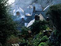 Clovelly Devon the main village street on steep slope group of cottages
