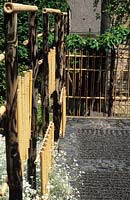 Zen garden Blockley Gloucestershire Design Tim Brown detail of use of bamboo fence