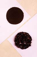 whole cloves and ground powder on paper still life spice