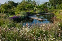 pond informal contemporary garden designer design Julie Toll Ian Kitson curved sinuous summer perennials ornamental grasses