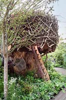 Tree house at The RHS Back to Nature Garden, Design: HRH The Duchess of Cambridge with Andree Davies and Adam White - Sponsor The RHS Chelsea Flower Show 2019