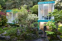 The Green Switch Garden, view  of the living spaces which overlook the garden and the moss covered rocks surrounding it - Designer: Kazuyuki Ishihara. Sponsor: G-Lion