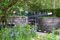 The Welcome to Yorkshire Garden, RHS Chelsea Flower Show 2019, Design: Mark Gregory, Sponsor: Welcome to Yorkshire - Canal and lock gates