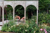 The Wedgwood Garden. Arched pavilions, a link with the past, straddle fresh planting of Roses, Digitalis, Angelica, Valerian and Irises. Design: Jo Thompson. Sponsors: Wedgwood.