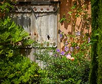 Decorative ornate doors in The Carpet Garden, Highgrove, June, 2019.