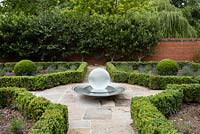 Water feature fountain - 'Aqualens' by Allison Armour. Reclaimed York stone paving
