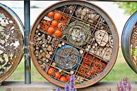 Old oil containers - insect bug hotel. hampton Court Flower Show 2014. Space to Connect and Grow. 