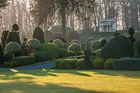 Italianate summerhouse looking over formal topiary garden at Brodsworth hall, Yorkshire.

