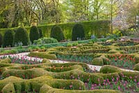 Overview of parterres and topiary garden at  Broughton Grange, Oxfordshire.