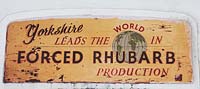 Wooden sign: Yorkshire leads the world in forced rhubarb production. 