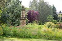 A neo-classical monument emerges from a flower meadow at Newby Hall Gardens, Yorkshire. 