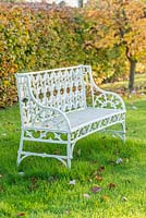 White painted Coalbrookdale gothic garden seat.