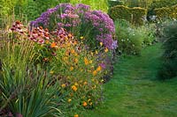 A view of a colourful herbaceous perennial border.