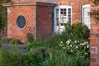 West Garden terrace with flower beds - Morton Hall Gardens, Worcestershire
