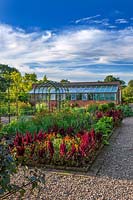 Kitchen garden with greenhouse and archways - Morton Hall Gardens, Worcestershire