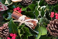 Christmas wreath with cinnamon and ilex