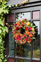  Summer wreath - designed and made by Susan Wright - hung on door.