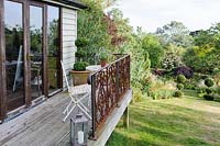 Garden studio with balcony over sloping garden, Dorset