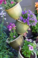 Ceramic pot tower with mixed colourful planting