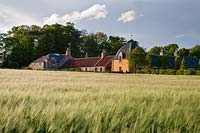 View of house from barley field.