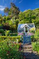 Gate into kitchen garden and greenhouse