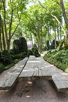 Table and oak benches by Thomas Rosler in the Jardin D'Aval. Les Jardins D'etretat, Normandy, France. 