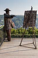 Claude Monet at his easel by Agneszka Gradzik and Victor Szostalo, Les Jardins D'etretat, Normandy, France.
